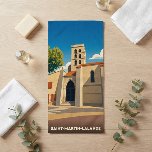 Serviette de bain souvenir de Saint-Martin-Lalande avec une illustration stylisée de son église.