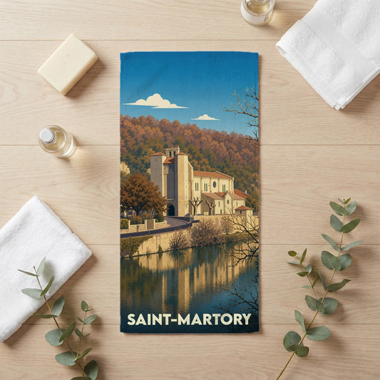 Serviette de bain souvenir de la ville de Saint-Martory avec une illustration stylisée.