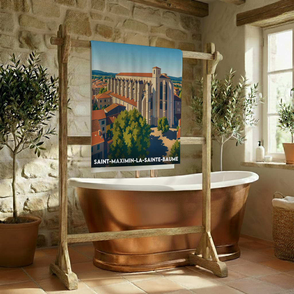 Serviette de bain souvenir de la ville de Saint-Maximin-la-Sainte-Baume avec une illustration stylisée.