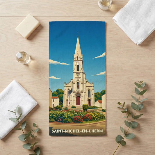 Serviette de bain souvenir de la ville de Saint-Michel-en-l'Herm avec une illustration stylisée de son église.