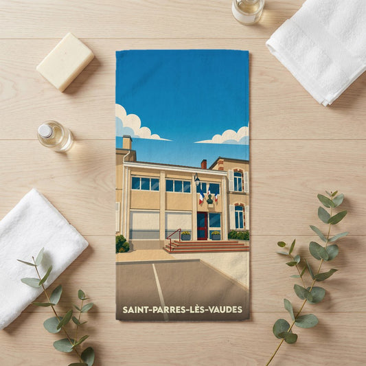 Serviette de bain souvenir de Saint-Parres-lès-Vaudes avec une illustration stylisée de la mairie.