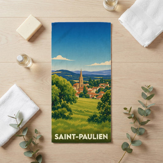 Serviette de bain souvenir de la ville de Saint-Paulien avec une illustration stylisée de son paysage et de son église.