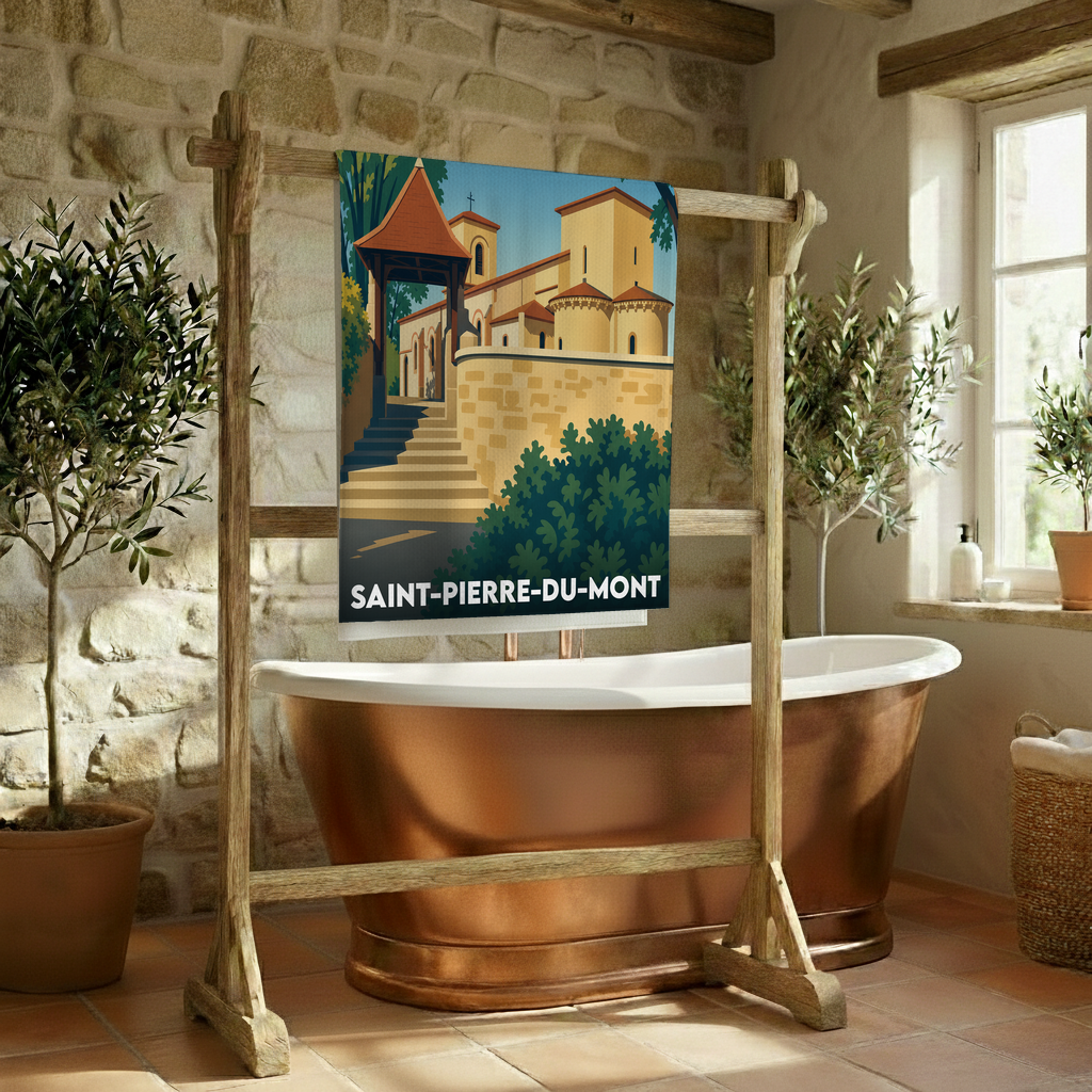 Serviette de bain souvenir de Saint-Pierre-du-Mont ornée d'une illustration colorée de son église romane.