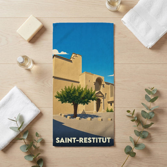Serviette de bain souvenir de la ville de Saint-Restitut avec une illustration stylisée.
