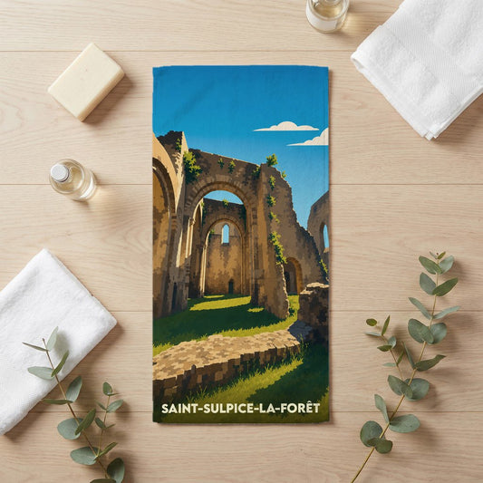 Serviette de bain souvenir de Saint-Sulpice-la-Forêt illustrant les ruines stylisées de son abbaye.