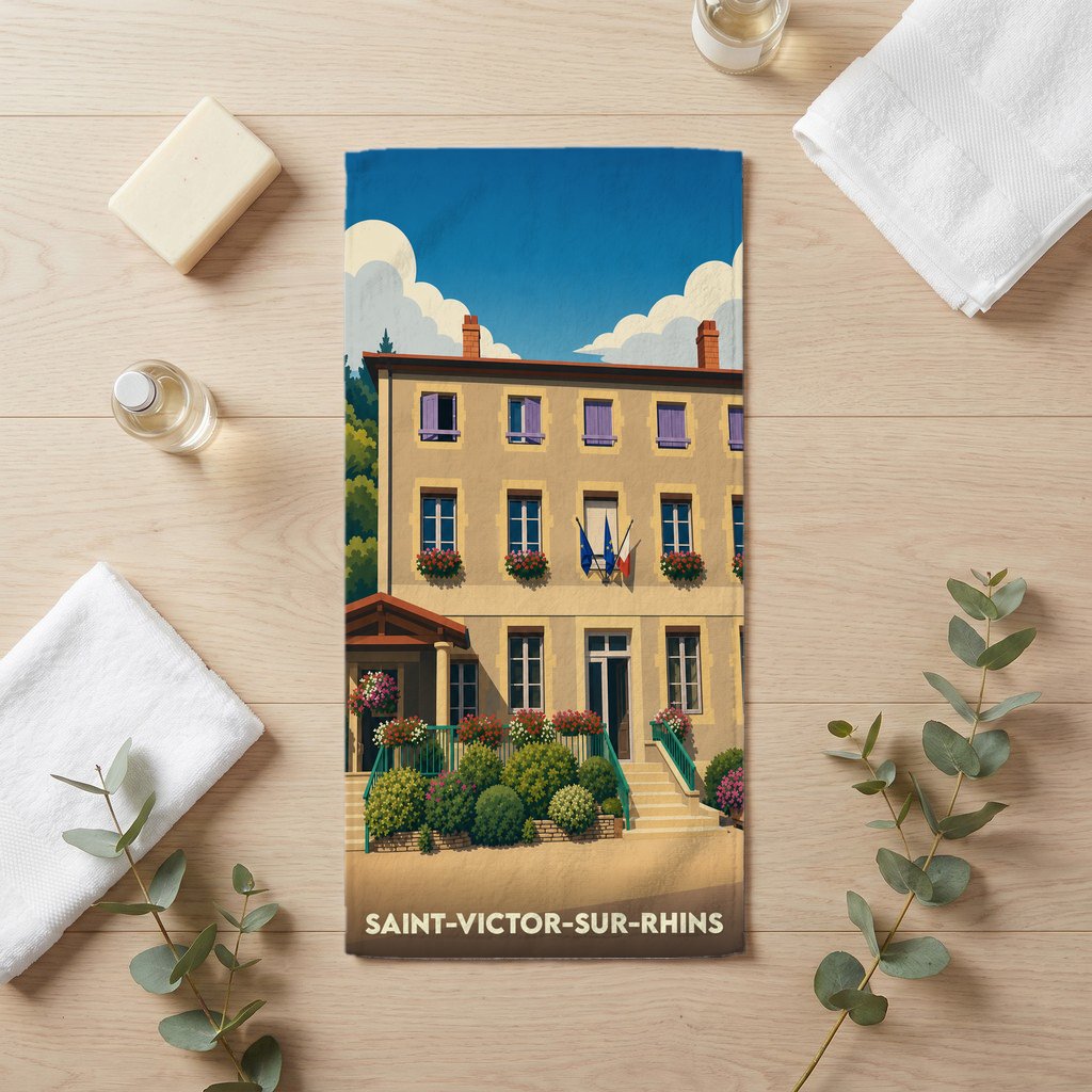 Serviette de bain souvenir de la ville de Saint-Victor-sur-Rhins avec une illustration stylisée.