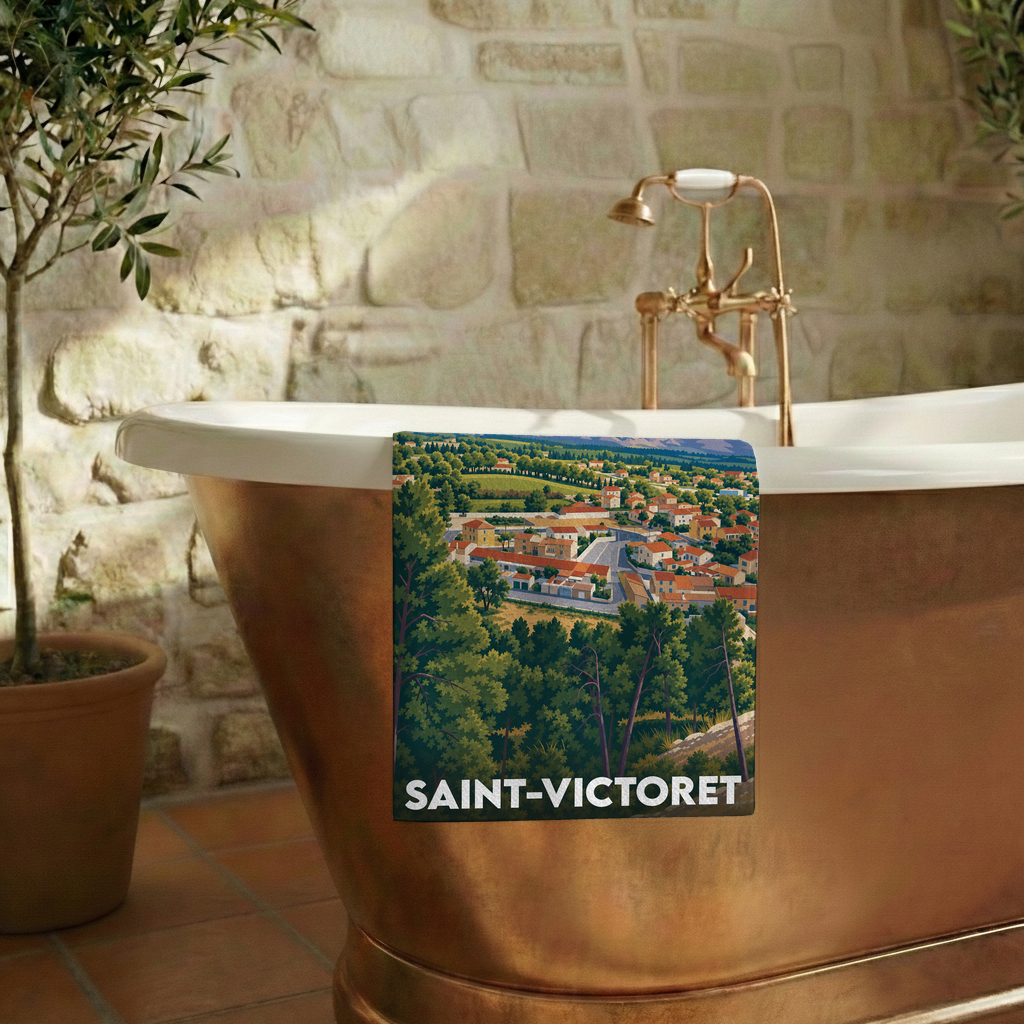 Serviette de bain souvenir de la ville de Saint-Victoret avec une illustration paysagère stylisée.