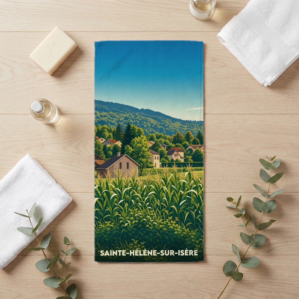 Serviette de bain souvenir de Sainte-Hélène-sur-Isère avec une illustration stylisée de paysages ruraux et montagneux.