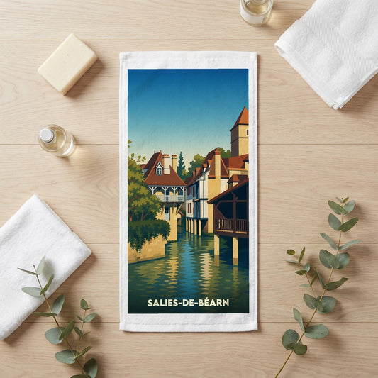 Serviette de bain souvenir de la ville de Salies-de-Béarn avec une illustration stylisée.