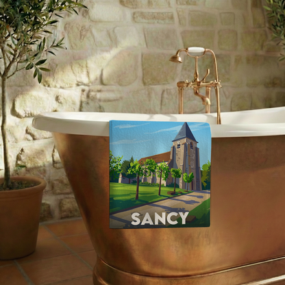 Serviette de bain souvenir de la ville de Sancy avec une illustration stylisée.