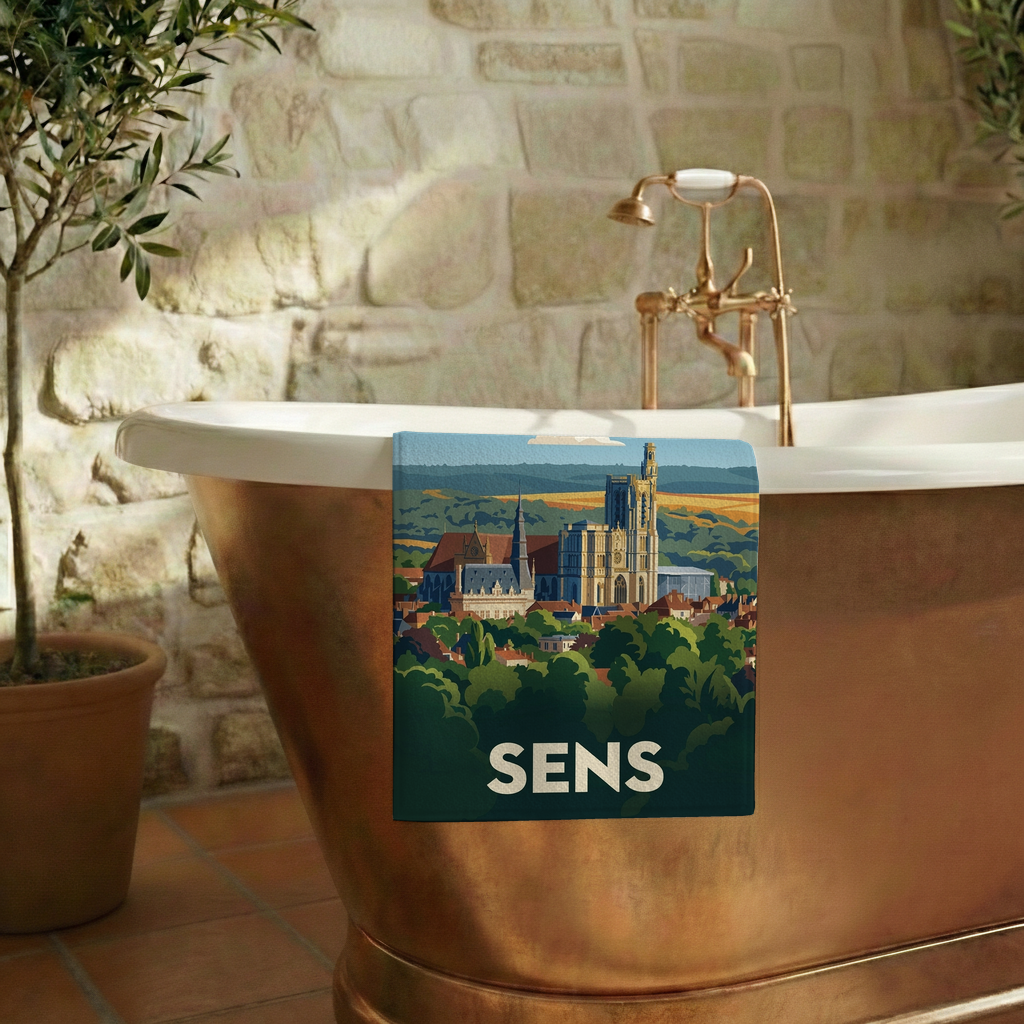 Serviette de bain souvenir de la ville de Sens avec une illustration stylisée.