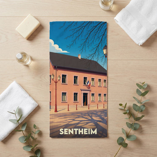 Serviette de bain souvenir de la ville de Sentheim avec une illustration stylisée.