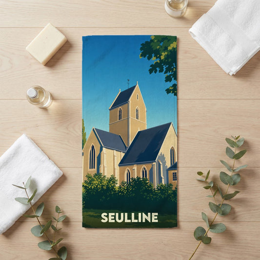 Serviette de bain souvenir de la ville de Seulline avec une illustration stylisée d'église.