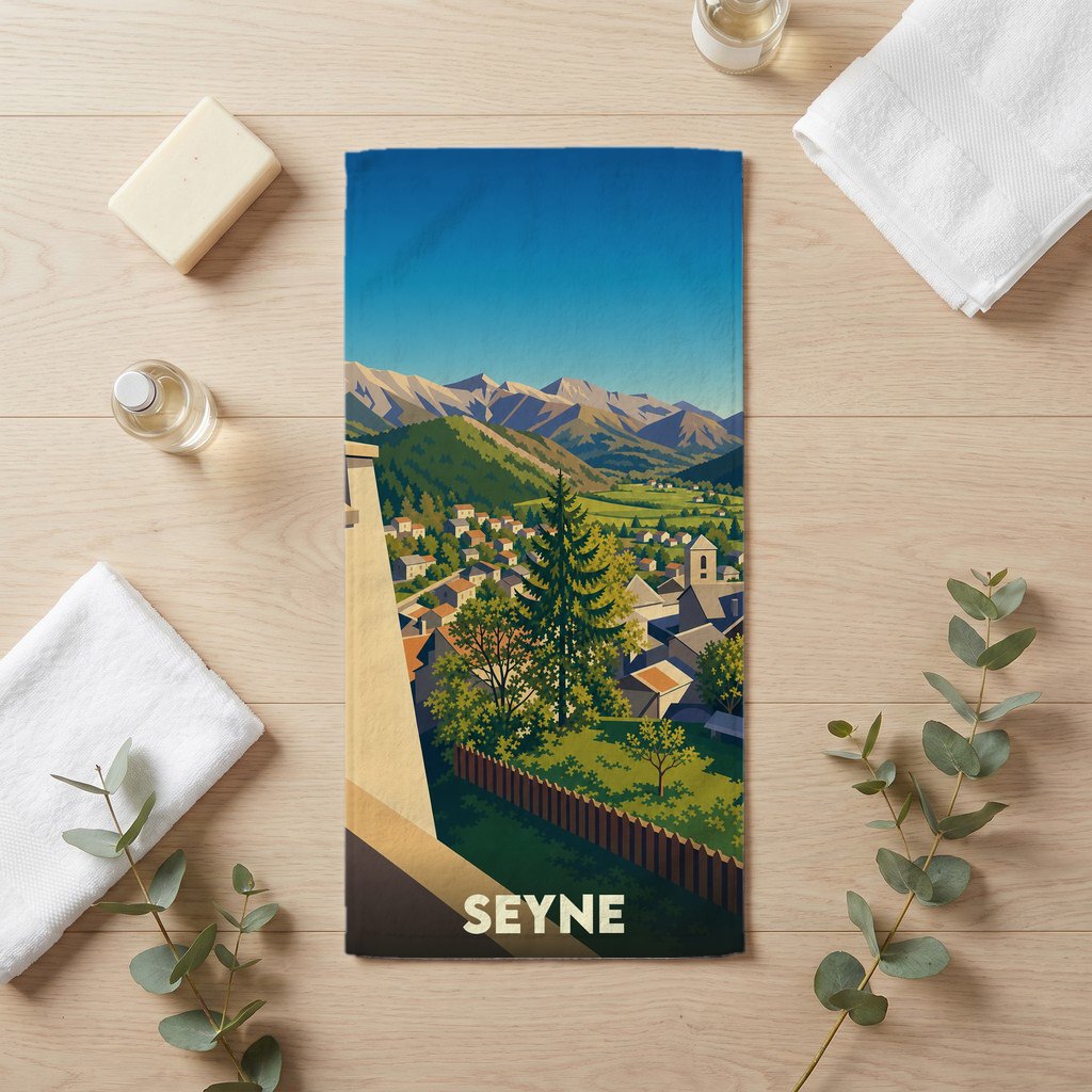 Serviette de bain souvenir de la ville de Seyne avec une illustration stylisée de montagne.