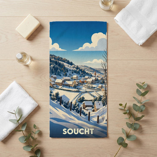 Serviette de bain souvenir de la ville de Soucht avec une illustration hivernale stylisée.