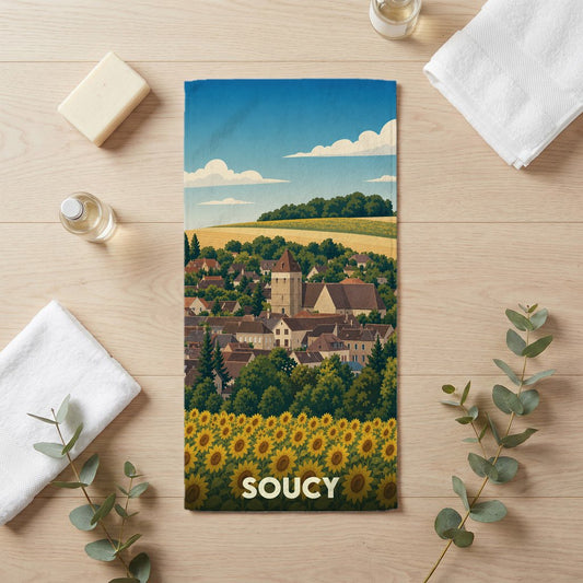 Serviette de bain souvenir de la ville de Soucy illustrée d'un paysage de campagne avec des tournesols.