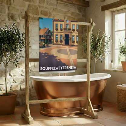 Serviette de bain souvenir de la ville de Souffelweyersheim avec une illustration stylisée.