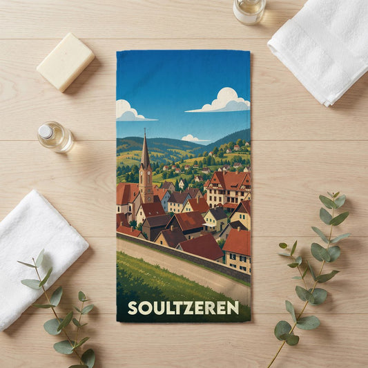 Serviette de bain souvenir de la ville de Soultzeren ornée d'une illustration de paysage de montagne.