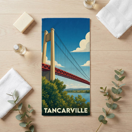Serviette de bain souvenir de la ville de Tancarville avec une illustration stylisée de son pont suspendu.