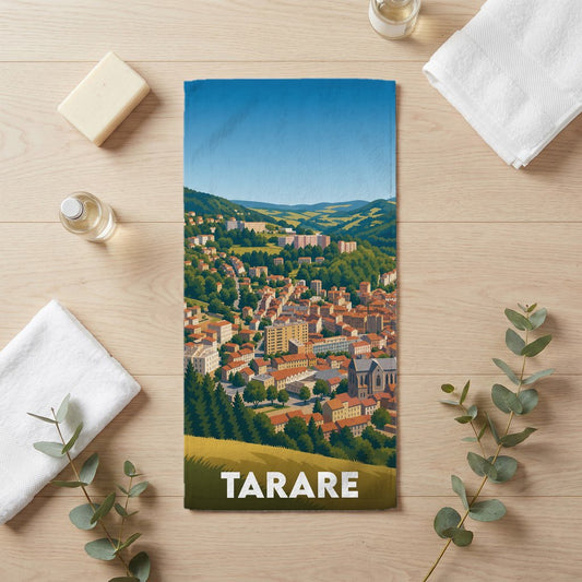 Serviette de bain souvenir de la ville de Tarare illustrée par une vue panoramique stylisée.