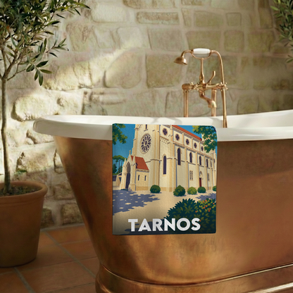 Serviette de bain souvenir de la ville de Tarnos avec une illustration stylisée.