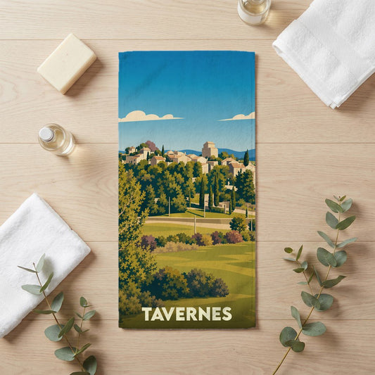 Serviette de bain souvenir de la ville de Tavernes avec une illustration paysagère stylisée.