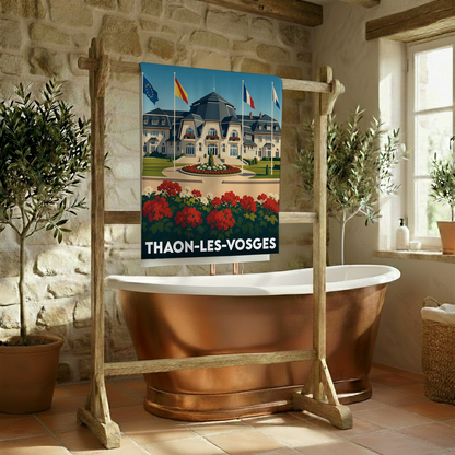 Serviette de bain souvenir de la ville de Thaon-les-Vosges avec une illustration stylisée d'un bâtiment historique et des massifs de fleurs.