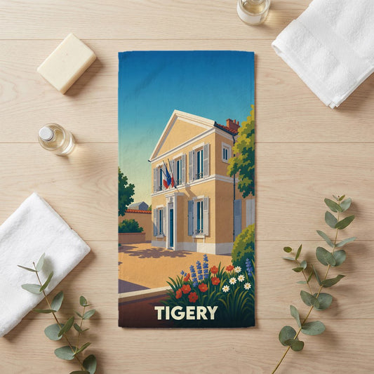 Serviette de bain souvenir de la ville de Tigery avec une illustration stylisée.