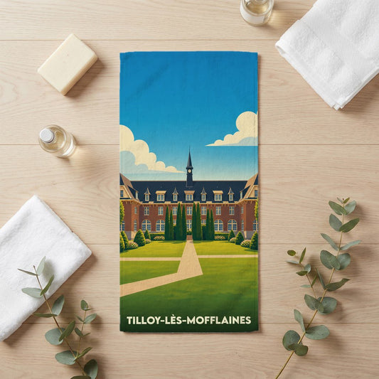 Serviette de bain souvenir de la ville de Tilloy-lès-Mofflaines avec une illustration stylisée d'un bâtiment historique.