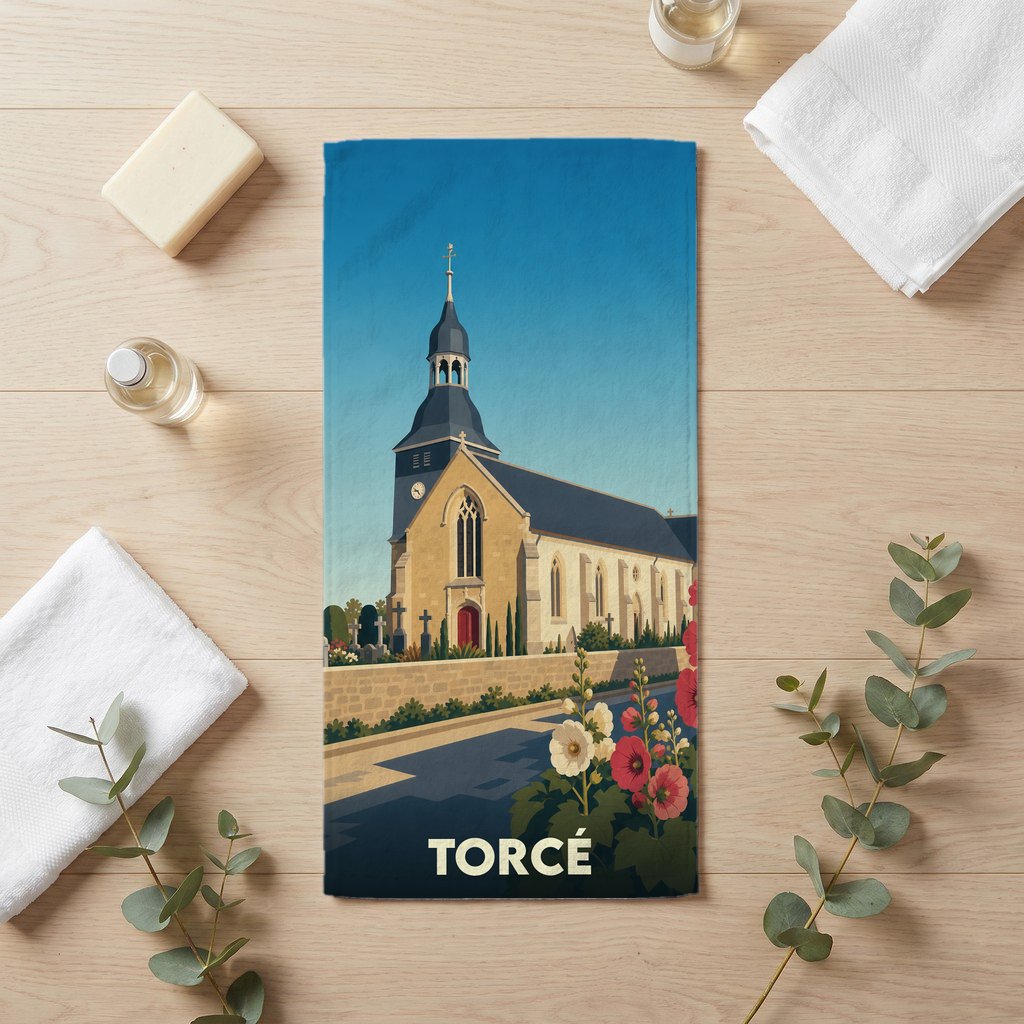 Serviette de bain souvenir de la ville de Torcé illustrant son église dans un style graphique épuré.