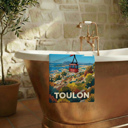 Serviette de bain souvenir de la ville de Toulon avec une illustration stylisée.