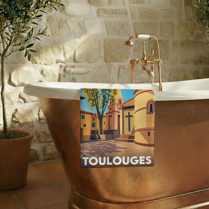 Serviette de bain souvenir de la ville de Toulouges avec une illustration stylisée.
