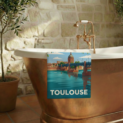 Serviette de bain souvenir de la ville de Toulouse avec une illustration stylisée.
