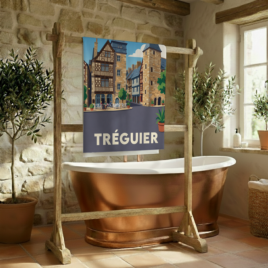 Serviette de bain souvenir de la ville de Tréguier avec une illustration stylisée de son architecture historique.