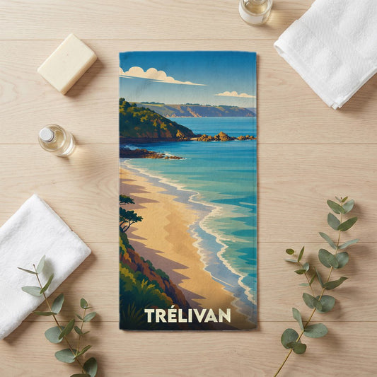 Serviette de bain souvenir de la ville de Trélivan avec une illustration stylisée d'un paysage côtier.