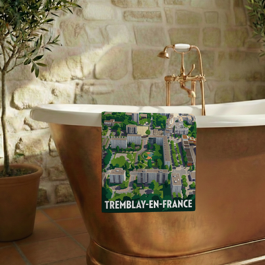 Serviette de bain souvenir de la ville de Tremblay-en-France avec une illustration stylisée.