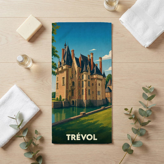 Serviette de bain souvenir de la ville de Trévol avec une illustration stylisée de son château.