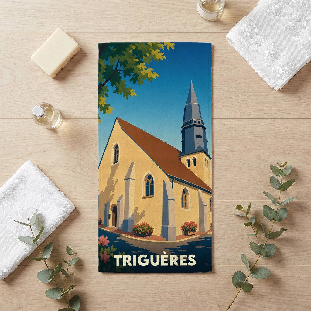 Serviette de bain souvenir de la ville de Triguères avec une illustration stylisée de son église.