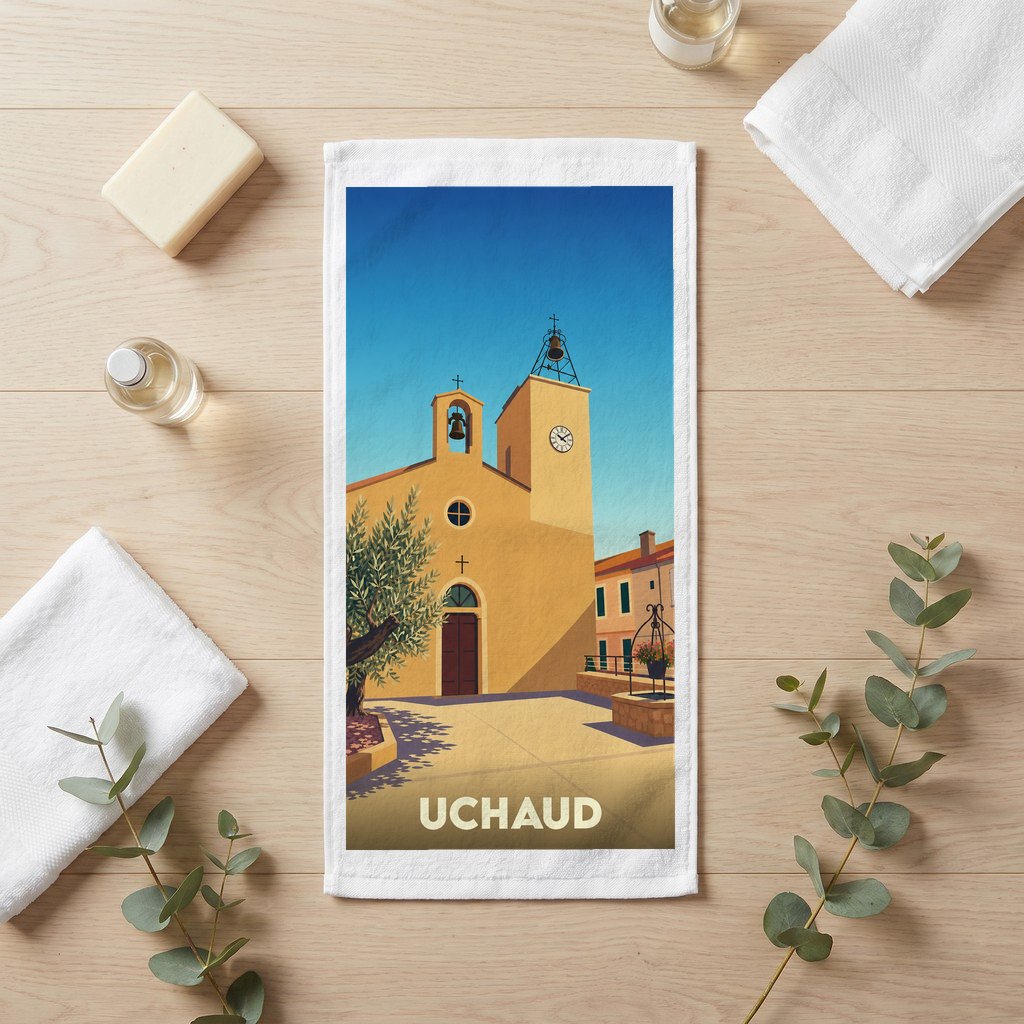 Serviette de bain souvenir de la ville de Uchaud avec une illustration stylisée.