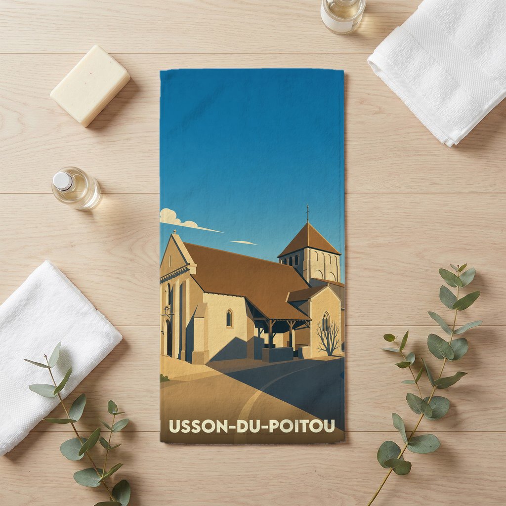 Serviette de bain souvenir de la ville de Usson-du-Poitou avec une illustration stylisée de son église.