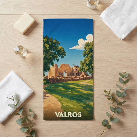 Serviette de bain souvenir de la ville de Valros avec une illustration stylisée de ruines historiques.