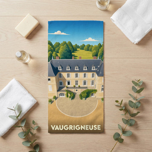 Serviette de bain souvenir de la ville de Vaugrigneuse avec une illustration stylisée d'un château.