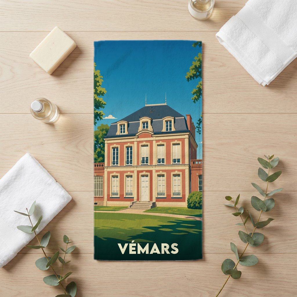 Serviette de bain souvenir de la ville de Vémars avec une illustration stylisée d'un manoir.