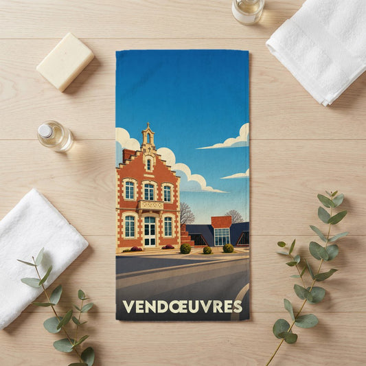 Serviette de bain souvenir de la ville de Vendœuvres avec une illustration stylisée.