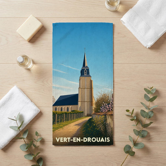 Serviette de bain souvenir de la ville de Vert-en-Drouais avec une illustration stylisée de son église.