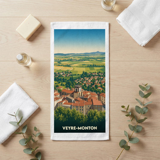 Serviette de bain souvenir de la ville de Veyre-Monton avec une illustration stylisée.