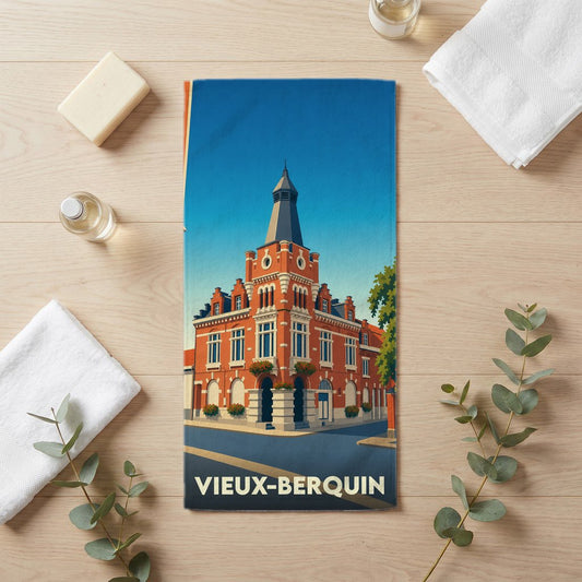Serviette de bain souvenir de la ville de Vieux-Berquin avec une illustration stylisée de son architecture.