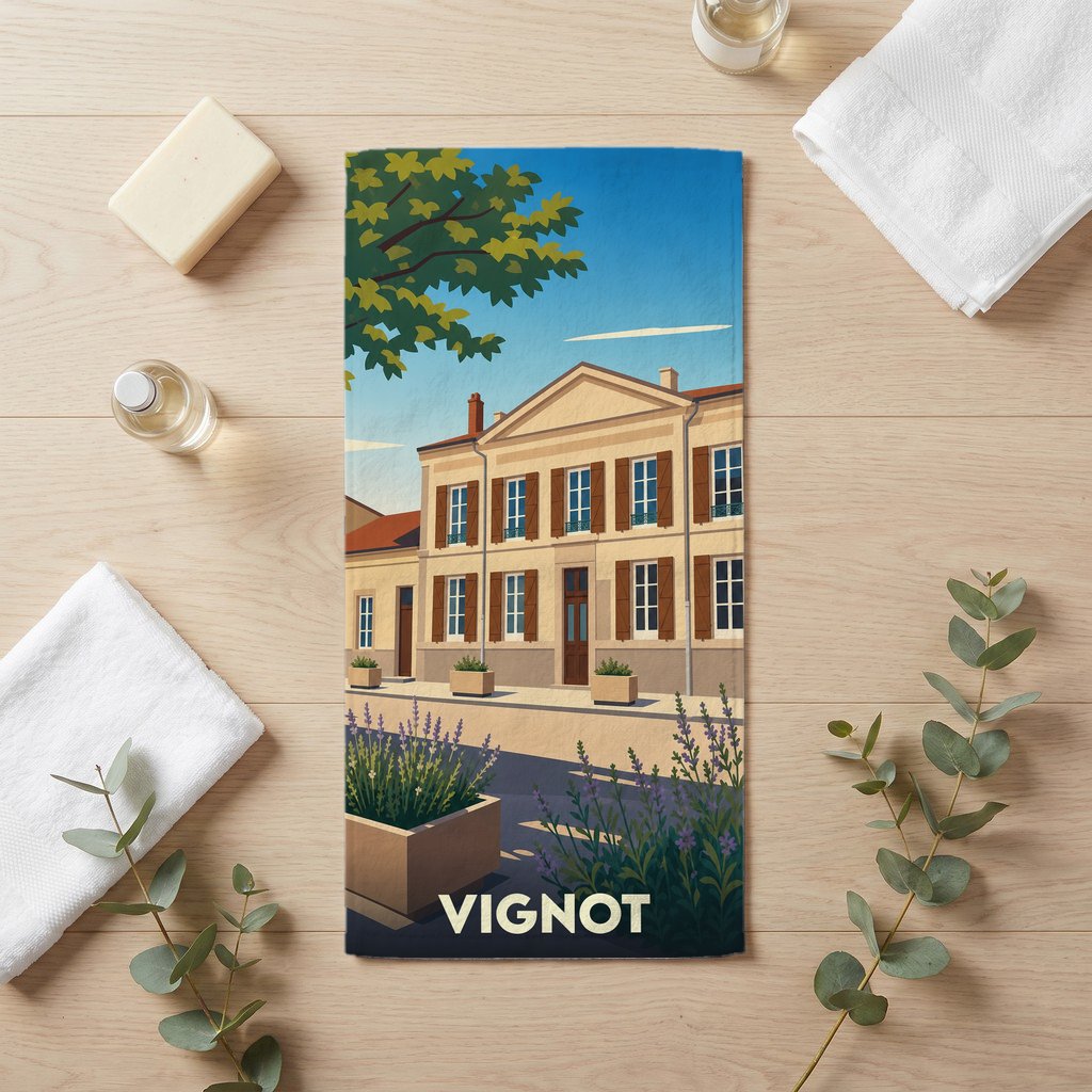 Serviette de bain souvenir de la ville de Vignot avec une illustration stylisée d'une maison de maître.