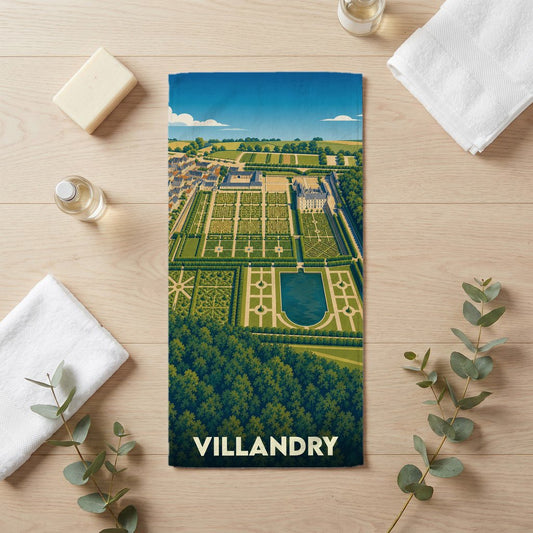 Serviette de bain souvenir de la ville de Villandry avec une illustration stylisée de ses jardins et de son château.
