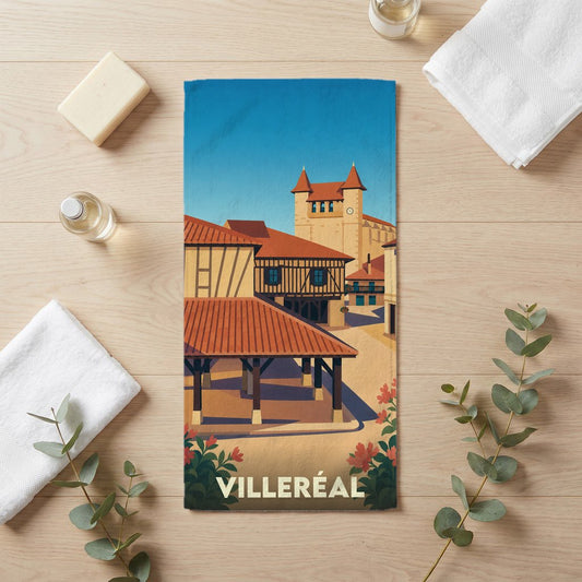 Serviette de bain souvenir de la ville de Villeréal avec une illustration stylisée de son architecture traditionnelle.